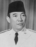 Sukarno was born on 6 June 1901 in Blitar, eastern Java, to a Javanese schoolteacher and a Balinese mother. His name was Kusno Sosrodihardjo, but he was renamed, as per Javanese custom, after surviving a childhood illness. His name is frequently spelled Soekarno after the Dutch spelling.<br/><br/>

Graduating with a degree in engineering in 1926, Sukarno became an accomplished architect in Bandung, western Java. His peers considered him modern and highly intelligent—reputedly endowed with a photographic memory—and he was fluent in nine languages. On 4 July, 1927, Sukarno and some friends founded the Partai Nasional Indonesia (PNI) with a view to fighting for Indonesian independence. Sentenced as a political prisoner in 1930, Sukarno's cause was widely reported in the Dutch East Indies and abroad, and, as a result, he was freed in 1931.<br/><br/>

Forever a thorn in the Dutch side, Sukarno continued to agitate. In 1942, the invading Japanese drove the Europeans from the islands, and turned to Sukarno and other former nationalists. Two days after the Japanese surrender to the Allies, on August 17, 1945, Sukarno declared Indonesian independence. Although the Dutch returned to reclaim their colony and Sukarno was arrested, Indonesian independence was ultimately recognised.<br/><br/>

Sukarno established a parliamentary democracy, but maintained strong personal control. He courted relations with the West, the Soviets and China. He was appointed President for Life in 1963, and his latter years were marked by a rule of personality cult. Sukarno was ousted from office by Gen Suharto in 1967 and held under house arrest until his death on 21 June 1970.