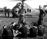 Operation Starlight, a U.S. Marine Corps search and destroy operation south of Chu Lai.  VC casualties stood at 599 killed and six captured.  Viet Cong prisoners await being carried by helicopter to rear area.  August 1965. JUSPAO Public Domain image (USIA).