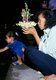 Thailand: Mother and daughter floating a krathong, Loy Krathong Festival, Chiang Mai