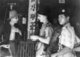 Malaysia: British and Malay military police check the credentials of an elderly Sino-Malay during the 'Emergency', April 1949.