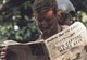 Cambodia: A US soldier reads 'Stars and Stripes' during a break in the US-South Vietnamese invasion of Cambodia, 1970.