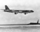 Guam:  A USAF B-52D Stratofortress is overshadowed by a USAF B-52G returning from a bombing mission over Hanoi (1972).