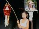 Thailand: Young girl with festival lantern, Loy Krathong Festival, Chiang Mai